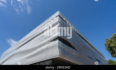 Nîmes, Gard, France - 08 17 2023 : View of the facade of the Musée de la Romanité archaeological museum by architect Elizabeth de Portzamparc Stock Photo