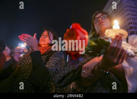 People holding candles take part in a memorial service for the victims of last Friday s attacks in Paris, in front of the City Hall of Los Angeles, the United States, on Nov. 17, 2015. ) US-LOS ANGELES-MEMORIAL-PARIS ATTACKS ZhaoxHanrong PUBLICATIONxNOTxINxCHN   Celebrities Holding Candles Take Part in a Memorial Service for The Victims of Load Friday S Attacks in Paris in Front of The City Hall of Los Angeles The United States ON Nov 17 2015 U.S. Los Angeles Memorial Paris Attacks ZhaoxHanrong PUBLICATIONxNOTxINxCHN Stock Photo