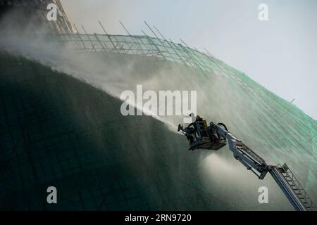 (151122) -- BEIJING, Nov. 22, 2015 -- Firemen try to put out the fire at the Macao Science Center in Macao, south China, Nov. 20, 2015. ) Xinhua Photo Weekly Choices cheongxkamxka PUBLICATIONxNOTxINxCHN   151122 Beijing Nov 22 2015 firemen Try to Put out The Fire AT The Macao Science Center in Macao South China Nov 20 2015 XINHUA Photo Weekly Choices CheongxKamxKa PUBLICATIONxNOTxINxCHN Stock Photo