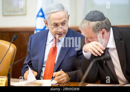 (151129) -- JERUSALEM, Nov. 29, 2015 -- Israeli Prime Minister Benjamin Netanyahu (L) leads the weekly cabinet meeting at the Prime Minister s office in Jerusalem, on Nov. 29, 2015. Israeli Prime Minister Benjamin Netanyahu on Sunday charged recent attacks by Palestinians are motivated by Muslim extremism rather than resistance to the Israeli occupation, shortly after two attacks occurred in Jerusalem. ) MIDEAST-JERUSALEM-ISRAEL-PM-ATTACKS-ISLAMIC EXTREMISM-MOTIVATION JINI PUBLICATIONxNOTxINxCHN   151129 Jerusalem Nov 29 2015 Israeli Prime Ministers Benjamin Netanyahu l leads The Weekly Cabine Stock Photo