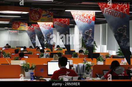 File photo taken on Nov. 16, 2015 shows posters of U.S. Black Friday , a day that Americans go shopping after celebrating Thanksgiving Day, at the office of a cross-border e-commerce platform in Shanghai, east China. The U.S. e-commerce holiday also attracted many Chinese online shoppers to purchase foreign goods. As host of the Second World Internet Conference (WIC) that is underway in Wuzhen in east China s Zhejiang Province, China called for global Internet interconnectivity and shared governance by all. As one of the greatest inventions of the 20th century, the Internet has turned the glob Stock Photo