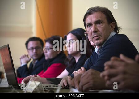 (160209) -- MEXICO CITY, Feb. 9, 2016 -- Argentine expert Miguel Nieva (R), of the Argentine Team of Forensic Anthropology (EAAF, for its acronym in Spanish) takes part in a press conference to announce the progress in the investigation of 43 students of the Normal School Raul Isidro Burgos in Ayotzinapa, in Mexico City, capital of Mexico, on Feb. 9, 2016. EAAF concluded after an investigation of more than one year that there is no scientific and biological evidence to conclude that 43 students of Ayotzinapa disappeared on Sept. 26, 2014, were incinerated in the rubbish dump of the Cocula comm Stock Photo