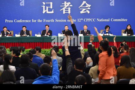 (160309) -- BEIJING, March 9, 2016 -- Journalists raise hands to ask questions during a press conference given by five members of the 12th National Committee of the Chinese People s Political Consultative Conference on the development of people s livelihood in Beijing, capital of China, March 9, 2016. )(mcg) (TWO SESSIONS)CHINA-BEIJING-CPPCC-PRESS CONFERENCE (CN) LixXin PUBLICATIONxNOTxINxCHN   Beijing March 9 2016 Journalists Raise Hands to ASK Questions during a Press Conference Given by Five Members of The 12th National Committee of The Chinese Celebrities S Political Consultative Conferenc Stock Photo