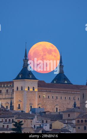 Full moon at historical castle Alcazar in old town Stock Photo