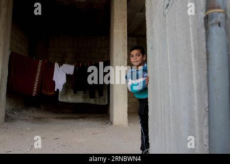 DAMASCUS, March 12, 2016 -- A boy stands in an abandoned building in the southern suburbs of Damascus, Syria, March 12, 2016. The Syrian civil war since March 2011 has made the Middle East country the world s single-largest source of refugees and displaced people, according to UN figures. The long-running conflict has claimed at least 250,000 lives and forced over 2 million children out of school. ) SYRIA-DAMASCUS-CRISIS-FIVE YEARS-CHILDREN YangxZhen PUBLICATIONxNOTxINxCHN   Damascus March 12 2016 a Boy stands in to Abandoned Building in The Southern suburbs of Damascus Syria March 12 2016 The Stock Photo