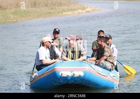 (160321) -- BARDIYA, March 21, 2016 -- British Prince Harry (C, front) takes a rafting tour during his visit to the Bardiya National Park in Bardiya, Nepal, March 21, 2016. British royal Prince Harry was in Nepal for a five-day official visit on behalf of the British government to mark the 200th anniversary of Nepal-Britain relations. )(azp) NEPAL-BARDIYA-PRINCE HARRY-VISIT PradeepxRajxOnta PUBLICATIONxNOTxINxCHN   Bardiya March 21 2016 British Prince Harry C Front Takes a Rafting Tour during His Visit to The Bardiya National Park in Bardiya Nepal March 21 2016 British Royal Prince Harry what Stock Photo