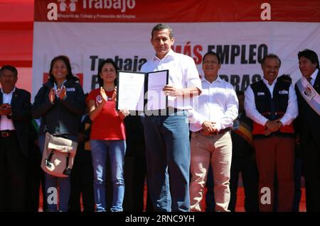 Peruvian President Ollanta Humala (C) takes part in a meeting with beneficiaries of the Peru Works program in Puno, Peru, on March 30, 2016. According to local press, Ollanta Humala signed the resolution of the increase of minimum living wage from 750 soles (some 222.9 U.S. dollars) to 850 soles (some 252.62 U.S. dollars) from May 1st. Presidency Press/) (fnc) (ah) PERU-PUNO-POLITICS-HUMALA ANDINA PUBLICATIONxNOTxINxCHN   Peruvian President Ollanta Humala C Takes Part in a Meeting With beneficiaries of The Peru Works Program in Puno Peru ON March 30 2016 According to Local Press Ollanta Humala Stock Photo