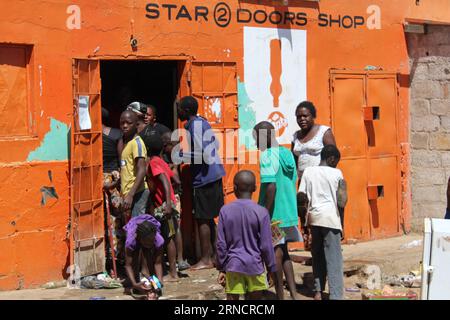 (160419) -- LUSAKA, April 19, 2016 -- Residents loot a shop in Bauleni township in Lusaka, capital of Zambia, April 19, 2016. Attacks on foreign owned shops in Lusaka, the Zambian capital have spread to other parts of the city with more shops attacked. The attacks started in the morning in two sprawling shanty compounds over rumors that foreigners were behind a spate of suspected ritual killings that have occurred in recent weeks. So far, over 250 people have been arrested in connection with the looting of shops owned by Rwandan nationals while the number of looted shops stands at 65, accordin Stock Photo