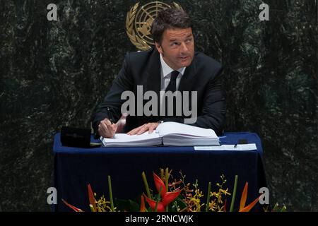 160422 -- UNITED NATIONS, April 22, 2016 -- Italian Prime Minister Matteo Renzi signs the Paris climate agreement at the United Nations headquarters in New York, April 22, 2016. The landmark Paris climate pact opened for signatures by leaders from 171 countries Friday morning, marking the first step toward the pact s entry into force.  UN-PARIS AGREEMENT-SIGNING CEREMONY LixMuzi PUBLICATIONxNOTxINxCHN Stock Photo