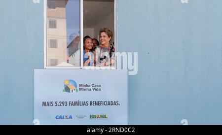 SALVADOR (BRAZIL), April 26, 2016 -- Photo provided by Brazil s Presidency shows Brazilian President Dilma Rousseff (R) interacting with residents during the handover ceremony of housing units, in Salvador de Bahia, Brazil, on April 26, 2016. Roberto Stuckert Filho/Brazil s Presidency) BRAZIL-SALVADOR-POLITICS-ROUSSEFF BRAZILIANxPRESIDENCY PUBLICATIONxNOTxINxCHN   Salvador Brazil April 26 2016 Photo provided by Brazil S Presidency Shows Brazilian President Dilma Rousseff r interacting With Residents during The Handover Ceremony of Housing Units in Salvador de Bahia Brazil ON April 26 2016 Robe Stock Photo