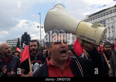 A protester chants slogans during a demonstration in Athens, Greece, on May 6, 2016. Greece s labour unions staged a general strike to protest against controversial government plans to overhaul pensions and increase taxes to meet demands of its bailout creditors. ) GREECE-ATHENS-STRIKE MariosxLolos PUBLICATIONxNOTxINxCHN   a protester Chants Slogans during a Demonstration in Athens Greece ON May 6 2016 Greece S Labour Unions staged a General Strike to Protest against controversial Government Plan to overhaul Pensions and Increase Taxes to Meet Demands of its Bailout creditors Greece Athens Str Stock Photo