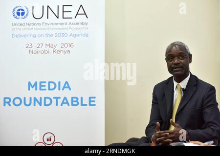 (160524) -- NAIROBI, le 24 mai 2016 -- Ibrahim Thiaw, directeur exécutif adjoint du Programme des Nations Unies pour l'environnement (PNUE), prend la parole lors d'une table ronde des médias dans le cadre de la deuxième édition de l'Assemblée des Nations Unies pour l'environnement à Nairobi, Kenya, le 24 mai 2016. Les institutions multilatérales, les gouvernements nationaux et la société civile doivent réorganiser les interventions politiques et législatives visant à éliminer les crimes contre les espèces sauvages en Afrique, a déclaré Ibrahim Thiaw mardi. KENYA-NAIROBI-ONU ENVIRONMENT ASSEMBLY-ANTI-WILDLIFE CRIMES SunxRuibo PUBLICATIONxNOTxINxCHN 160524 Nairobi mai 24 2016 Ibrahim U n Environmen Banque D'Images