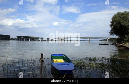 (160531) -- BELGRADE, May 31, 2016 -- Photo taken on May 18, 2016 shows the view of the Pupin Bridge on Danube river in Belgrade, Serbia. The Bridge, named after Serbian scientist and inventor Mihajlo Pupin, was opened by Premier of the People s Republic of China Li Keqiang and his Serbian counterpart Aleksandar Vucic on December 18, 2014. As the second bridge over the Danube river in Belgrade, it has ended the history that for 70 years there was only one bridge in Belgrade over Danube. Connecting Zemun on the south of Danube and Borca on the north, the bridge has shortened the travel time fro Stock Photo
