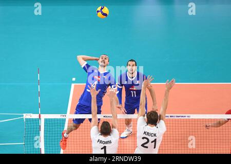 Jean Patry (France) ; Christian Fromm, Tobias Krick (Allemagne). Championnat du monde de volleyball 2022. Banque D'Images