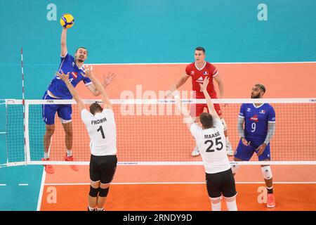 Jean Patry (France) ; Christian Fromm, Lukas Maase (Allemagne). Championnat du monde de volleyball 2022. Banque D'Images