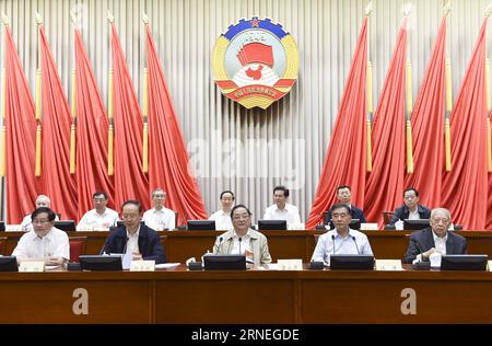 (160622) -- BEIJING, June 22, 2016 -- Yu Zhengsheng (C), chairman of the National Committee of the Chinese People s Political Consultative Conference (CPPCC), attends the opening meeting of the 16th meeting of the Standing Committee of the 12th CPPCC National Committee in Beijing, capital of China, June 22, 2016. Chinese Vice Premier Wang Yang also attended the meeting. ) (zkr) CHINA-BEIJING-YU ZHENGSHENG-CPPCC-MEETING (CN) GaoxJie PUBLICATIONxNOTxINxCHN   160622 Beijing June 22 2016 Yu Zheng Sheng C Chairman of The National Committee of The Chinese Celebrities S Political Consultative Confere Stock Photo