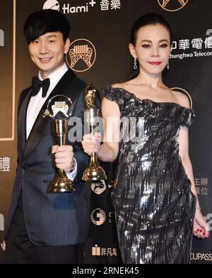 (160626) -- TAIPEI, June 25, 2016 -- Singers JJ Lin (L) and Julia Peng, who win the Best Male and Female Mandarin Singer, pose with the awards during the awarding ceremony of the 27th Golden Melody Awards in Taipei, southeast China s Taiwan, June 25, 2016. (wyo) CHINA-TAIPEI-GOLDEN MELODY AWARDS (CN) photomall PUBLICATIONxNOTxINxCHN   160626 Taipei June 25 2016 Singers JJ Lin l and Juliet Peng Who Win The Best Male and Female Mandarin Singer Pose With The Awards during The awarding Ceremony of The 27th Golden MELODY Awards in Taipei South East China S TAIWAN June 25 2016 wyo China Taipei Golde Stock Photo