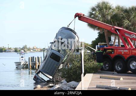 July 14, 2016 - St. Pete Beach, Florida, U.S. - Times. A Mercedes Benz vehicle is pulled from the inter coastal waterway in St. Pete Beach, Thursday, 7/14/16 as the Pinellas County Sheriff s office divers worked the scene. The driver escaped from the vehicle. (Credit Image: © /Tampa Bay Times via ZUMA Wire) Florida News - July 14, 2016 ScottxKeeler PUBLICATIONxNOTxINxCHN ZUMA-20160714 zan s70 002.jpg   July 14 2016 St Pete Beach Florida U S Times a Mercedes Benz Vehicle IS pulled from The Inter Coastal Waterway in St Pete Beach Thursday 7 14 16 As The Pinellas County Sheriff S Office Divers Wo Stock Photo