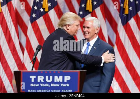 (160716) -- NEW YORK, 16 juillet 2016 -- Donald Trump (G), candidat républicain présumé à la présidence, et son coéquipier, le gouverneur de l'Indiana, Mike Pence (D), sont apparus pour la première fois en public ensemble depuis que Pence a été nommé coéquipier de Trump, à New York, aux États-Unis, le 16 juillet 2016. Donald Trump, candidat républicain à la présidence des États-Unis, a annoncé vendredi qu'il avait choisi le gouverneur de l'Indiana Mike Pence comme colistier. US-NEW YORK-TRUMP-PENCE-CAMPAGNE PRÉSIDENTIELLE LIXMUZI PUBLICATIONXNOTXINXCHN Banque D'Images