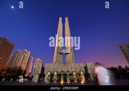 TANGSHAN, July 28, 2016 -- A citizen mourns for relatives killed in the 1976 Tangshan earthquake in front of the Earthquake Monument in Tangshan, north China s Hebei Province, July 28, 2016. In the early hours of July 28, 1976, a 7.8-magnitude earthquake struck the city in Hebei Province, killing over 242,000 people. Local residents came to the Tangshan Earthquake Ruins Memorial Park and the Earthquake Monument to show love to their deceased family members and friends on Thursday. ) (mcg) CHINA-HEBEI-TANGSHAN-EARTHQUAKE-COMMEMORATION (CN) ZhaoxLiang PUBLICATIONxNOTxINxCHN   Tang Shan July 28 2 Stock Photo