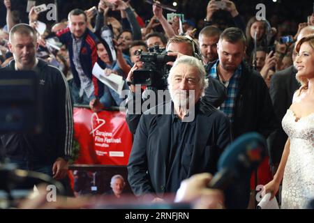 (160813) -- SARAJEVO, Aug. 12, 2016 -- U.S. actor Robert De Niro (C) arrives for the opening ceremony of the 22nd Sarajevo Film Festival held in Sarajevo, Bosnia and Herzegovina, Aug. 12, 2016. A total of 222 films from 61 countries and regions around the world will be shown to audiences during the festival, which will be closed on Aug. 20. ) BOSNIA AND HERZEGOVINA-SARAJEVO-SARAJEVO FILM FESTIVAL HarisxMemija PUBLICATIONxNOTxINxCHN   160813 Sarajevo Aug 12 2016 U S Actor Robert de Niro C arrives for The Opening Ceremony of The 22nd Sarajevo Film Festival Hero in Sarajevo Bosnia and Herzegovina Stock Photo