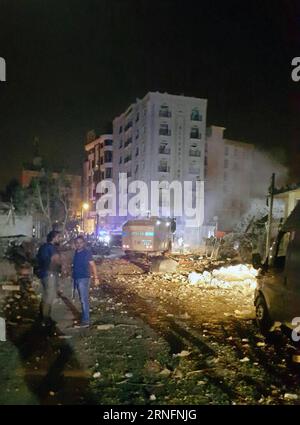 Themen der Woche Bilder des Tages Anschlag im Osten der Türkei ANKARA, Aug. 17, 2016 -- Damaged road and buildings are seen at the blast site in Van, eastern Turkey, on Aug. 17, 2016. Three civilians were killed and 40 others injured in a car bombing and gunfire attacks on the police headquarter in eastern Turkish province of Van on late Wednesday, Dogan News Agency reported. )(axy) TURKEY-VAN-ATTACK MertxMacit PUBLICATIONxNOTxINxCHN   Topics the Week Images the Day Stop in East the Turkey Ankara Aug 17 2016 damaged Road and Buildings are Lakes AT The Blast Site in van Eastern Turkey ON Aug 17 Stock Photo