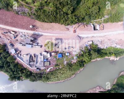 (160819) -- CHONGQING, Aug. 18, 2016 -- Photo taken on Aug. 18, 2016 shows an emergency construction site of the Ganshui-Chatan section of the Sichuan-Guizhou Railway. A landslide triggered by continuous heavy rains cut off the railway service on the major line linking southwest China s Sichuan and Guizhou provinces in June. After two months of reconstruction, the service will resume soon. ) (wx) CHINA-SICHUAN-GUIZHOU-RAILWAY-RESUME (CN) LiuxChan PUBLICATIONxNOTxINxCHN   160819 Chongqing Aug 18 2016 Photo Taken ON Aug 18 2016 Shows to EMERGENCY Construction Site of The Ganshui Chatan Section o Stock Photo