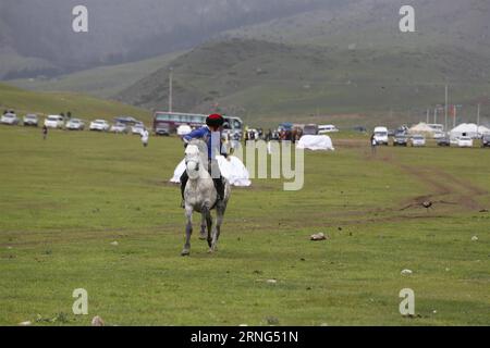 (160905) -- CHOLPON-ATA, Sept. 5, 2016 -- A competitor for traditional hunting rides to hunt during the third day of the Second World Nomad Games in Cholpon-Ata, Kyrgyzstan, on Sept. 5, 2016. The Second World Nomad Games, starting on Sept. 3 through to 8, will be attended by around 500 athletes in 26 sports. ) (SP)KYRGYZSTAN-CHOLPON-ATA-WORLD NOMAD GAMES-HUNTING RomanxGainanov PUBLICATIONxNOTxINxCHN   160905 Cholpon Ata Sept 5 2016 a Competitor for Traditional Hunting Rides to Hunt during The Third Day of The Second World Nomad Games in Cholpon Ata Kyrgyzstan ON Sept 5 2016 The Second World No Stock Photo