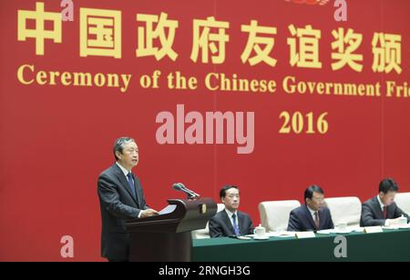 (160929) -- BEIJING, Sept. 29, 2016 -- Chinese Vice Premier Ma Kai (1st L) speaks during the ceremony of the Friendship Award issued by the Chinese government to honor outstanding foreign experts working in China, in Beijing, capital of China, Sept. 29, 2016. ) (mp) CHINA-BEIJING-MA KAI-FRIENDSHIP AWARD-CEREMONY (CN) DingxLin PUBLICATIONxNOTxINxCHN   Beijing Sept 29 2016 Chinese Vice Premier MA Kai 1st l Speaks during The Ceremony of The friendship Award issued by The Chinese Government to HONOR Outstanding Foreign Experts Working in China in Beijing Capital of China Sept 29 2016 MP China Beij Stock Photo