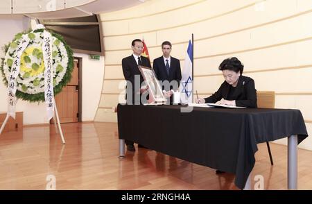 (160929) -- BEIJING, Sept. 29, 2016 -- Chinese Vice Premier Liu Yandong (R) signs the condolence book at the Israeli Embassy in Beijing, capital of China, Sept. 29, 2016. Liu Yandong on Thursday visited the Israeli Embassy in Beijing and mourned the passing of former Israeli leader Shimon Peres. Liu expressed deep condolences on behalf of the Chinese government and people. ) (mp) CHINA-BEIJING-LIU YANDONG-ISRAEL-PERES-MOURN(CN) DingxHaitao PUBLICATIONxNOTxINxCHN   Beijing Sept 29 2016 Chinese Vice Premier Liu Yandong r Signs The condolence Book AT The Israeli Embassy in Beijing Capital of Chin Stock Photo