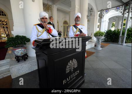 (161011) -- SINGAPORE, Oct. 11, 2016 -- Two Sikh doormen perform their duties at the Raffles Hotel Singapore, Oct. 11, 2016. Raffles Hotels & Resorts announced a 3-phase restoration programme for Raffles Hotel Singapore in 2017, with Raffles Hotel Singapore operations closing only on the final phase before a grand reopening in the 2nd quarter of 2018. ) (cyc) SINGAPORE-RAFFLES HOTEL-RESTORATION ThenxChihxWey PUBLICATIONxNOTxINxCHN   Singapore OCT 11 2016 Two Sikh Doormen perform their duties AT The Raffles Hotel Singapore OCT 11 2016 Raffles Hotels & Resorts announced a 3 Phase Restoration Pro Stock Photo