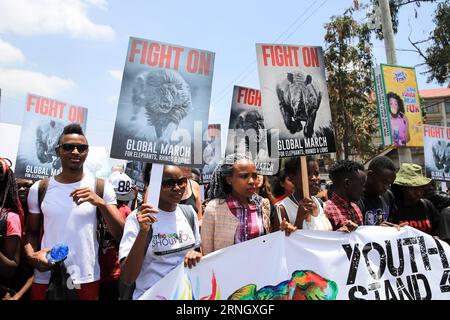 (161015) -- NAIROBI, le 15 octobre 2016 -- des résidents kenyans participent à la Marche mondiale pour les éléphants, les rhinocéros et les lions à Nairobi, capitale du Kenya, le 15 octobre 2016. Environ 2 000 personnes ont participé à la Marche mondiale pour galvaniser le soutien à la protection des éléphants, des rhinocéros et des lions qui sont confrontés à de graves menaces comme le braconnage et l'épuisement de leurs habitats à Nairobi samedi. (zy) KENYA-NAIROBI-MARCH-WILDLIFE CONSERVATION PanxSiwei PUBLICATIONxNOTxINxCHN 161015 Nairobi OCT 15 2016 des résidents kenyans participent à la Marche mondiale pour les éléphants rhinocéros et lions à Nairobi capitale du Kenya OCT Banque D'Images