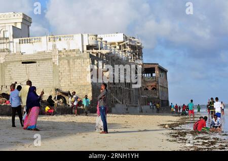 (161022) -- MOGADISHU, Oct. 22, 2016 -- Residents pose for pictures on a beach in Mogadishu, Somalia, Oct. 19, 2016. Somalia is a country located in the Horn of Africa, a peninsula in East Africa. Mogadishu, the main port and the biggest city of Somalia, was founded in initial of the tenth century and it was one of the earliest African settlements in the east coast of Africa in history. The country was trapped in war since the 1990s. ) (wtc) SOMALIA-MOGADISHU-DAILY LIFE LixBaishun PUBLICATIONxNOTxINxCHN   Mogadishu OCT 22 2016 Residents Pose for Pictures ON a Beach in Mogadishu Somalia OCT 19 Stock Photo