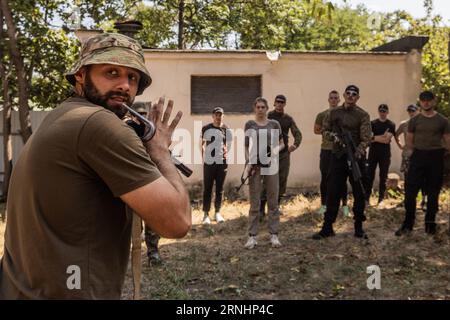 Odesa, Ukraine. 27th Aug, 2023. Volunteers are given battlefield survival training from members of the Azov Brigade during military training for civilians in Odesa. Not only men volunteer, ever since the outbreak of hostilities in eastern Ukraine in 2014, women have been an integral part of the Ukrainian armed forces and volunteer battalions.(Credit Image: © Svet Jacqueline/ZUMA Press Wire) EDITORIAL USAGE ONLY! Not for Commercial USAGE! Stock Photo