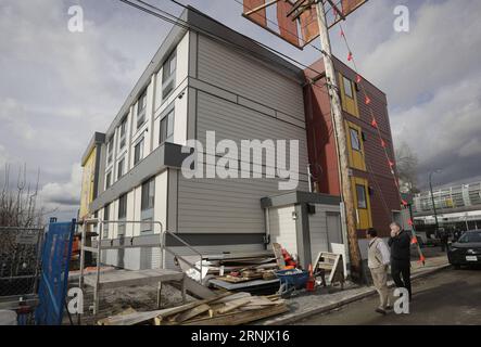 (170217) -- VANCOUVER, le 16 février 2017 -- le premier complexe de logements modulaires temporaires de la ville a eu lieu à Vancouver, Canada, le 16 février 2017. La ville de Vancouver a dévoilé son premier ensemble de logements modulaires temporaires. Les unités de maison modulaires sont réutilisables et peuvent être déplacées facilement dans différents endroits. )(gj) CANADA-VANCOUVER-LOGEMENT MODULAIRE TEMPORAIRE LiangxSen PUBLICATIONxNOTxINxCHN Vancouver février 16 2017 le premier complexe de logements modulaires temporaires de la ville S EST Lakes à Vancouver Canada février 16 2017 la ville de Vancouver a dévoilé son premier projet de logements modulaires temporaires le Modular Ho Banque D'Images