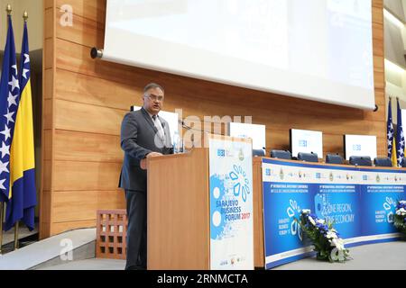 (170522) -- SARAJEVO, le 22 mai 2017 -- Mladen Ivanic, président de la présidence de Bosnie-Herzégovine (BiH), prend la parole lors de la cérémonie d'ouverture du huitième Forum des affaires de Sarajevo (SBF) au Parlement à Sarajevo, BiH, le 22 mai 2017. Le huitième Sarajevo Business Forum (SBF) s'est ouvert ici lundi sur le thème d'une région, d'une économie. ) BOSNIE-HERZÉGOVINE-SARAJEVO-SARAJEVO BUSINESS FORUM HarisxMemija PUBLICATIONxNOTxINxCHN Sarajevo Mai 22 2017 Président de la présidence de Bosnie-Herzégovine BIH Mladen Ivanic prend la parole LORS DE la cérémonie d'ouverture du huitième Sarajevo Business Forum SB Banque D'Images