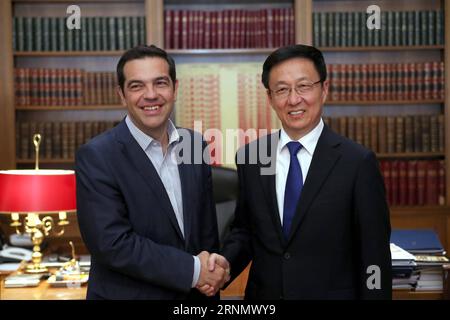 (170613) -- ATHÈNES, 13 juin 2017 -- le Premier ministre grec Alexis Tsipras (à gauche) serre la main de Han Zheng, membre du bureau politique du Comité central du Parti communiste chinois (PCC) et secrétaire du Comité municipal de Shanghai du PCC lors de leur réunion à Athènes, en Grèce, le 12 juin 2017. GREECE-ATHENS-PM-CHINA-HAN ZHENG-MEETING MariosxLolos PUBLICATIONxNOTxINxCHN Athènes juin 13 2017 le Premier ministre grec Alexis Tsipras serre la main de Han Zheng, membre du bureau politique du Comité central du Parti communiste chinois PCC et secrétaire du PCC Banque D'Images