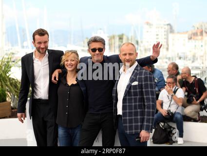 (180511) -- CANNES, le 11 mai 2018 -- l'acteur Tomasz Kot, l'actrice Joanna Kulig, le réalisateur Pawel Pawlikowski et l'acteur Borys Szyc assistent au photocall de la Guerre froide lors du 71e Festival annuel de Cannes à Cannes, France, le 11 mai 2018. )(yk) FRANCE-CANNES- GUERRE FROIDE -PHOTOCALL LuoxHuanhuan PUBLICATIONxNOTxINxCHN Banque D'Images