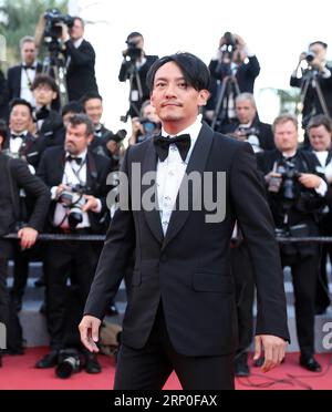 (180511) -- CANNES, 11 mai 2018 -- membre du jury, l'acteur chinois Zhang Zhen pose sur le tapis rouge avant la première du film Ash is Purest White au 71e Festival de Cannes, France, le 11 mai 2018. Le 71e Festival de Cannes se tient ici du 8 au 19 mai. ) FRANCE-CANNES-FILM FESTIVAL- ASH EST BLANC LE PLUS PUR -PREMIERE LUOXHUANHUAN PUBLICATIONXNOTXINXCHN Banque D'Images