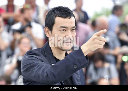 (180512) -- CANNES, 12 mai 2018 -- l'acteur chinois Liao fan du film chinois en compétition, Ash is Purest White , pose lors d'un photocall du 71e Festival International du film de Cannes à Cannes, France, le 12 mai 2018. Le 71e Festival International du film de Cannes se tient du 8 au 19 mai. Chen Yichen)(yk) FRANCE-CANNES-FILM FESTIVAL-ASH EST LE PLUS PUR BLANC-PHOTOCALL chenyichen PUBLICATIONxNOTxINxCHN Banque D'Images
