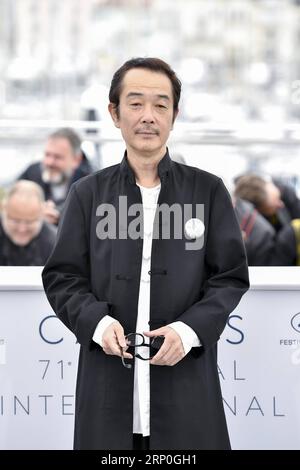 (180514) -- CANNES, 14 mai 2018 -- l'actrice Lily Franky pose lors d'un photocall pour le film japonais Shoplifters au 71e Festival International du film de Cannes à Cannes, France, le 14 mai 2018. Le 71e Festival International du film de Cannes se tient du 8 au 19 mai. ) (HY) FRANCE-CANNES-71ST INT L FILM FESTIVAL- VOLEURS À L'ÉTALAGE -PHOTOCALL CHENXYICHEN PUBLICATIONXNOTXINXCHN Banque D'Images