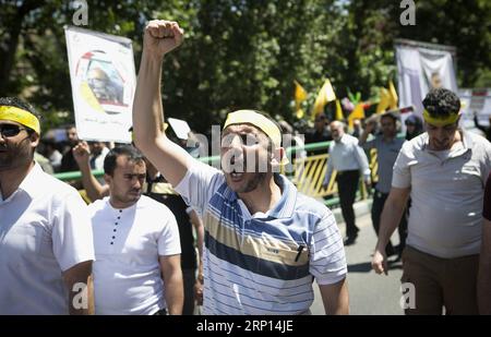 (180608) -- TÉHÉRAN, le 8 juin 2018 -- des personnes assistent à un rassemblement pour marquer la Journée de Qods (Jérusalem) dans le centre-ville de Téhéran, Iran, le 8 juin 2018. Des centaines de milliers d'Iraniens ont organisé des rassemblements massifs dans tout le pays vendredi pour marquer la Journée de Qods (Jérusalem) pour soutenir les Palestiniens, tout en dénonçant les politiques d'Israël et des États-Unis. RALLYE IRAN-TÉHÉRAN-JÉRUSALEM AhmadxHalabisaz PUBLICATIONxNOTxINxCHN Banque D'Images