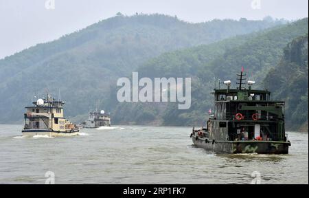 (180703) -- BEIJING, le 3 juillet 2018 -- des patrouilleurs conjoints avec des agents des forces de l'ordre de la Chine, de la Thaïlande, du Laos et du Myanmar naviguent sur le fleuve Lancang-Mékong, le 17 mars 2015.) Xinhua Headlines : Comment la coopération Lancang-Mekong change la région ChenxHaining PUBLICATIONxNOTxINxCHN Banque D'Images