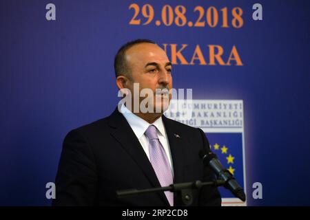 (180830) -- ANKARA, 30 août 2018 -- le ministre turc des Affaires étrangères Mevlut Cavusoglu prend la parole lors d'une conférence de presse après la réunion du Groupe d'action pour la réforme de l'UE à Ankara, Turquie, le 29 août 2018. Après un gel de près de trois ans, le gouvernement turc a rencontré mercredi les ministres du Groupe d'action pour la réforme de l'UE pour intensifier son programme de reservation des liens avec le bloc voisin. (gj) RÉUNION AFFAIRE TURQUIE-ANKARA-UE MustafaxKaya PUBLICATIONxNOTxINxCHN Banque D'Images
