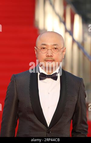 (181025) -- TOKYO, 25 octobre 2018 (Xinhua) -- l'acteur chinois Xu Zheng est photographié sur le tapis rouge pour la cérémonie d'ouverture du 31e Festival international du film de Tokyo, Tokyo, Japon, le 25 octobre 2018. (Xinhua/du Xiaoyi)(dtf) JAPON-TOKYO-FILM FESTIVAL-TAPIS ROUGE PUBLICATIONxNOTxINxCHN Banque D'Images