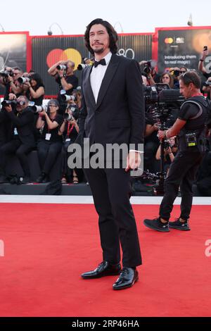 VENISE, ITALIE - 31 août : Adam Driver assiste à un tapis rouge pour le film 'Ferrari' au 80e Festival International du film de Venise le 31 août 2023 à Banque D'Images
