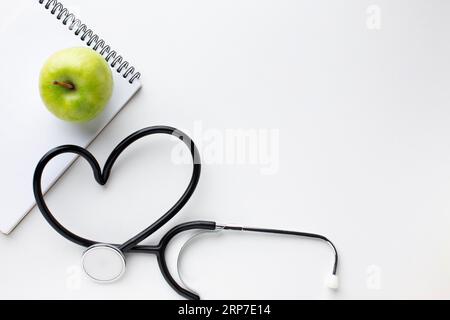 Stéthoscope pomme verte vue de face Banque D'Images