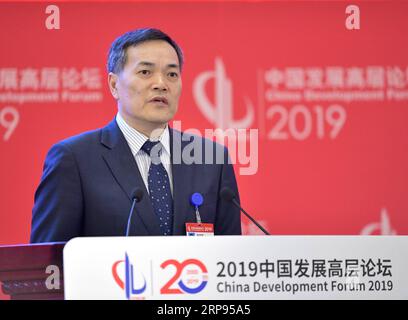 (190324) -- BEIJING, 24 mars 2019 (Xinhua) -- le vice-ministre chinois du Commerce, Qian Keming, prend la parole lors du Forum de développement de la Chine 2019 à Beijing, capitale de la Chine, le 24 mars 2019. (Xinhua/Li He) CHINA-BEIJING-DEVELOPMENT FORUM (CN) PUBLICATIONxNOTxINxCHN Banque D'Images