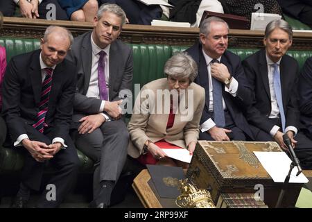 (190329) -- LONDRES, le 29 mars 2019 -- la première ministre britannique Theresa May (C) assiste au débat à la Chambre des communes à Londres, en Grande-Bretagne, le 29 mars 2019. Vendredi, les législateurs britanniques ont voté pour rejeter l accord de Brexit de la première ministre Theresa May, qui a déjà été rejeté deux fois au Parlement depuis janvier. CRÉDIT OBLIGATOIRE HOC : GRANDE-BRETAGNE-LONDRES-BREXIT ACCORD-REJET UKxParliament/MarkxDuffy PUBLICATIONxNOTxINxCHN Banque D'Images