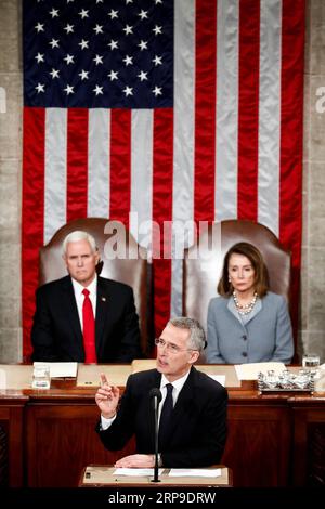 (190403) -- WASHINGTON, le 3 avril 2019 -- le secrétaire général de l'OTAN, Jens Stoltenberg (Front), prononce une allocution lors d'une réunion conjointe du Congrès américain à Washington D.C., aux États-Unis, le 3 avril 2019. Jens Stoltenberg a déclaré mercredi que l'alliance militaire ne voulait pas d'une nouvelle course aux armements avec la Russie, tout en exhortant Moscou à maintenir le respect d'un traité historique sur le contrôle des armements. ÉTATS-UNIS-WASHINGTON D.C.-OTAN-JENS STOLTENBERG TINGXSHEN PUBLICATIONXNOTXINXCHN Banque D'Images